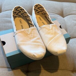TOMS Classic White Canvas Slip-Ons